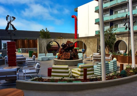 Gather with friends on plush loungers around the social courtyard.