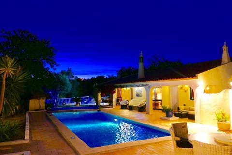 Heated pool with underwater light for warm evening swimming under the stars
