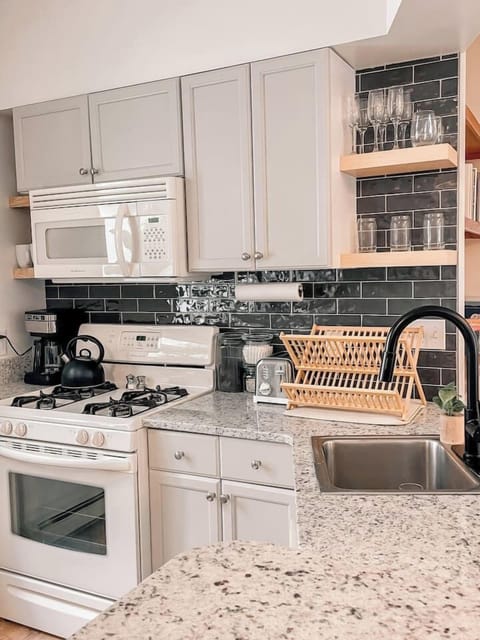 Recently updated kitchen with modern amenities for culinary adventures.