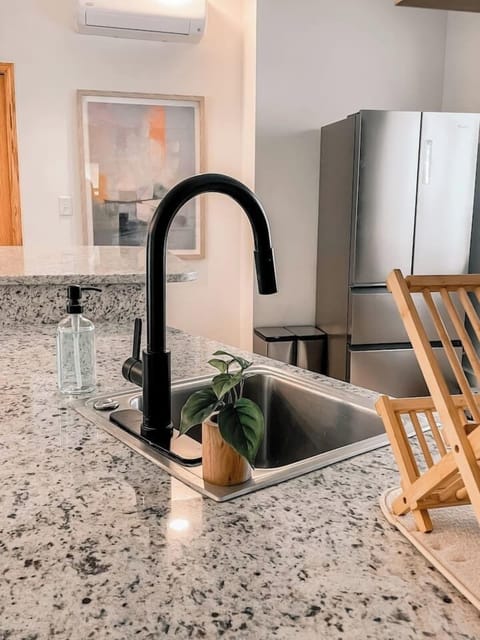 The newly updated kitchen features granite countertops and modern appliances.