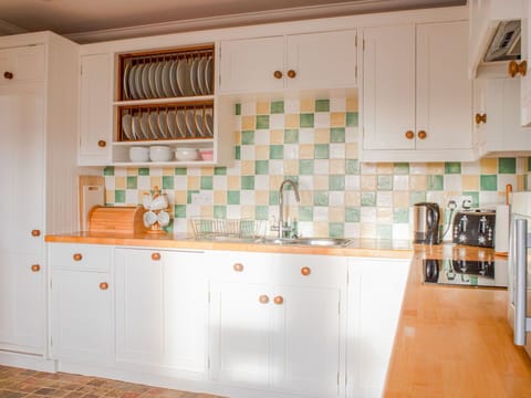 Kitchen, Countertop, Interior Design, Cabinetry, Flooring, Kitchen Appliance, Floor, Cupboard, Drawer, Room