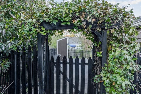The adorable vine-covered gateway to your private patio!