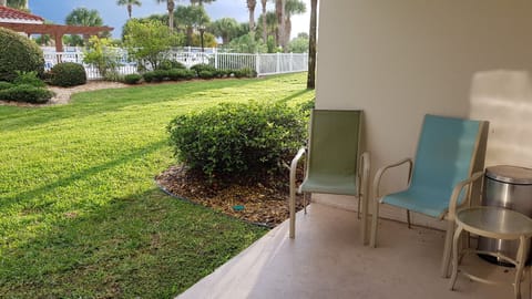 Ground Floor Patio outside Unit O14. O15 has a similar patio with view of pool.