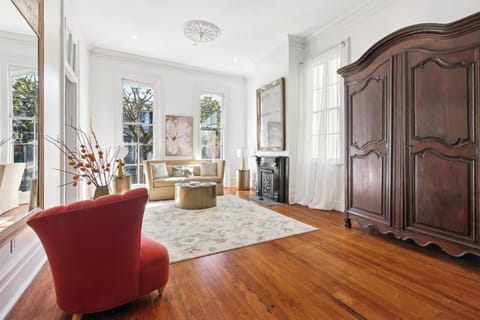 Elegant, formal living room, light-filled space with 13 foot ceilings. 