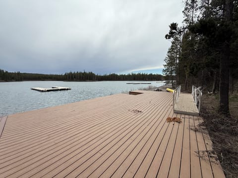 The is a private dock and boat dock on the waterfront property. 