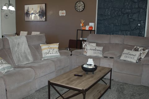 Living area, recliner sofa  loveseat,  52" HDTV, with a very relaxed feelings