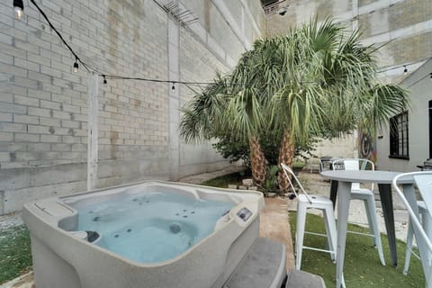 Relax in the cozy outdoor shared hot tub.

