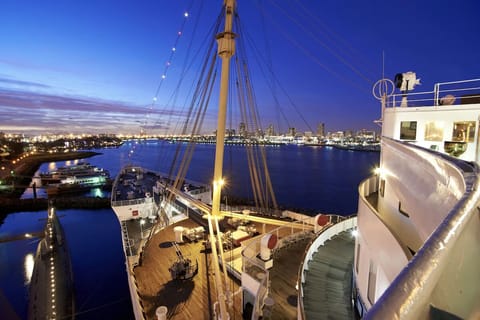Soak in twinkling city lights from the ship’s deck.