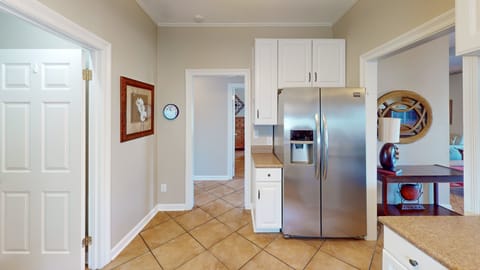 Multiple entry points to the kitchen provide easy access to the kitchen for late-night snacking.