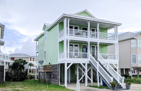 Our spacious 5BR/3.5BA beach retreat is ideal for your next family vacation. Perfectly situated between Little Lagoon and the beach at the west end, you'll enjoy breathtaking views from all 4 balconies.