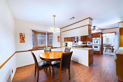 Dining Room: Gather around the elegant table, perfect for sharing meals and stories!