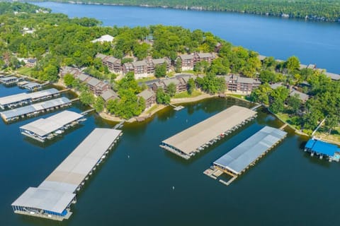 Welcome to The Knolls! See the extensive docks and prime lake access that await your stay at Knoll Worries, our luxury 2-bedroom condo. Enjoy seamless boating, fishing, and all the incredible community amenities this exclusive Lake of the Ozarks resort of