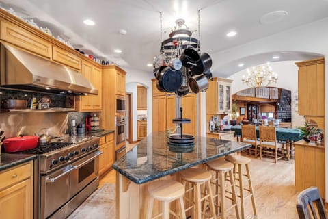 Chef's Dream Kitchen! Fully equipped with all the pots, pans, and cooking utensils needed to whip up a professionally prepared meal.