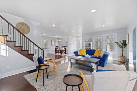 Gather the whole family in this light-filled Fort Wayne house. Two distinct living spaces mean the kids can stream games while you unwind on the vibrant velvet couch with a glass of wine.