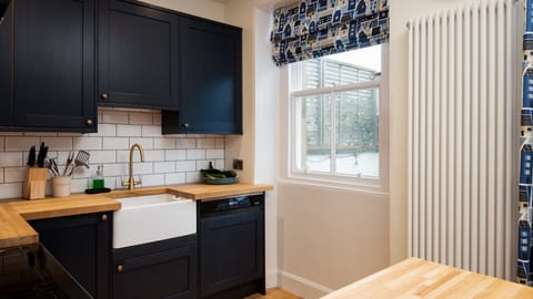 Dalgety - the kitchen with a window looking out onto the courtyard