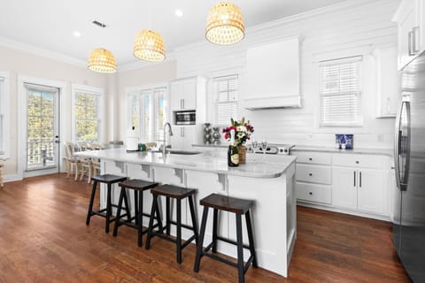 Full kitchen is beautiful and functional