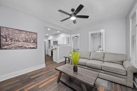 Spacious living room with modern furnishings, perfect for relaxing after a day of exploration