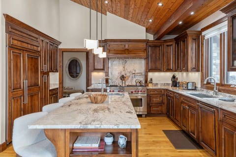 Modern kitchen with a huge island and bar seating