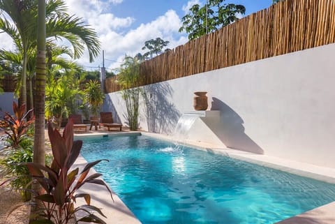 Fantastic pool with an incredible artificial waterfall. It has two loungers for enjoyment.