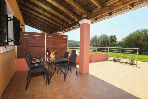 Private exterior patio and garden view from the property