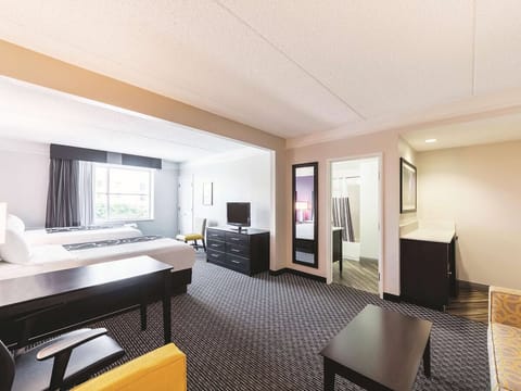Lounge and work comfortably in a roomy, open-concept suite.