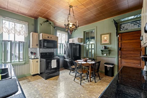 View into the kitchen showcasing the generous preparation areas and elegant cabinetry.
