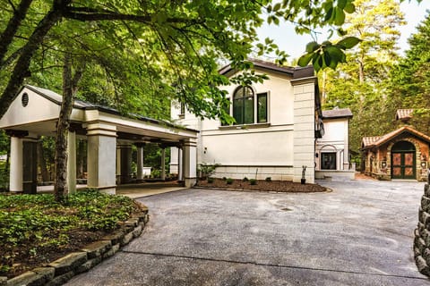 Front circular driveway with two street entrances and parking for 8-10 cars