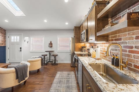 Fully equipped kitchen with all your cooking essentials, drip coffee maker + coffee. Dining table with seating for 2. This room opens up into the living room. Rustic and bold western decor throughout the entire condo!