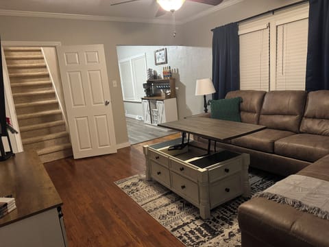 MAIN LEVEL ENTRY:   Living Room, Stairs leading up to the Loft and open from Living Room  to Deluxe Coffee Station into Kitchen, Games in uplifted Coffee Table