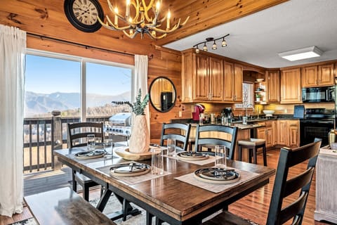 Gather around the table for memorable meals, game nights, or morning coffee while taking in panoramic views of the Smoky Mountains.