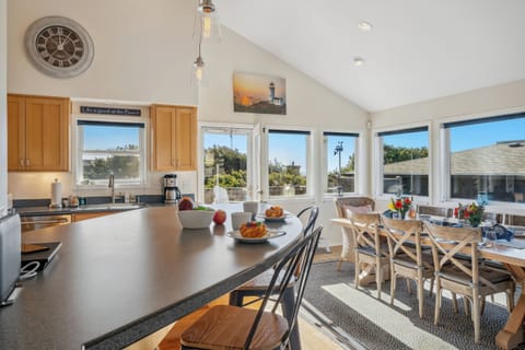 Gourmet kitchen with breakfast bar and ocean view