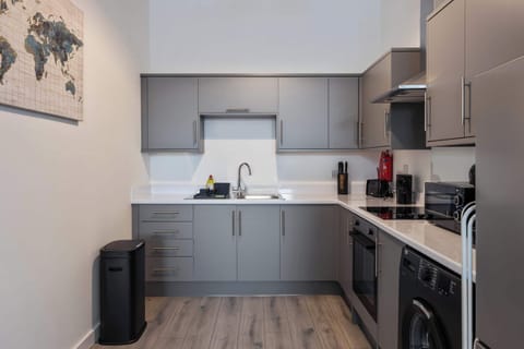 Well equipped Kitchen with washing machine, oven, hob, microwave, fridge, kettle, toaster, coffee maker and utensils