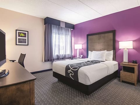 Unwind in a bright, cozy room with crisp linens.