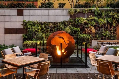 A fire pit and furnished patio
