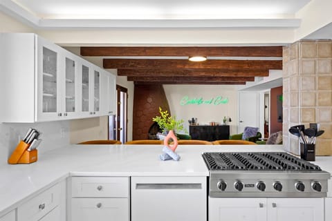 Featuring ample cabinetry, expansive cooking space, and high-end appliances for all your culinary adventures!