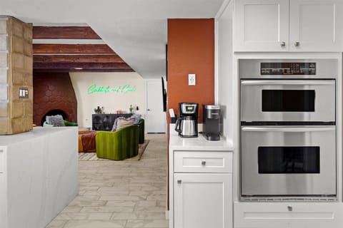 Featuring ample cabinetry, expansive cooking space, and high-end appliances for all your culinary adventures!