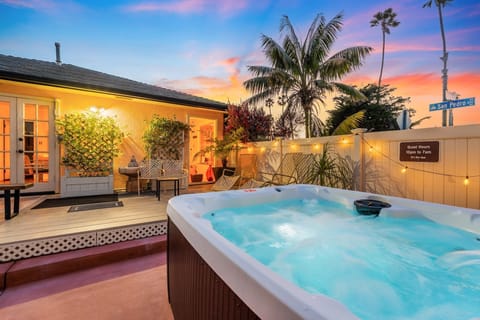 Unwind beneath the stars in your private outdoor jacuzzi sanctuary.