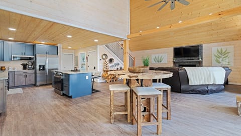 Relax in this spacious open-concept living area with a cozy kitchen & dining!