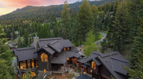 Private luxury mountain retreat surrounded by pines and scenic views