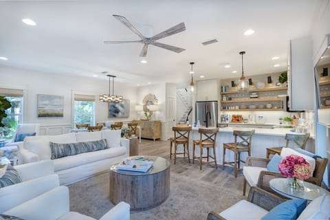 Open concept living room with seating for seven