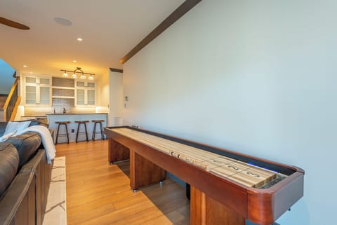 Play shuffleboard in the den downstairs and use the additional bar area to whip up some drinks & snacks to enjoy.