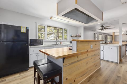 Kitchen Includes two Refrigerators and two Freezers