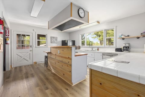 Kitchen Includes two Refrigerators and two Freezers