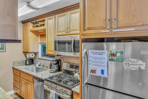Kitchen: Main floor, drip coffee maker, Crockpot, toaster, cooking utensils