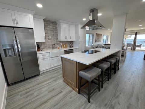 Kitchen with island and bar seating
