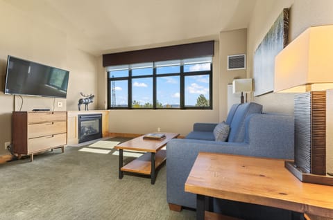 Furniture, Indoors, Living Room, Screen, Table