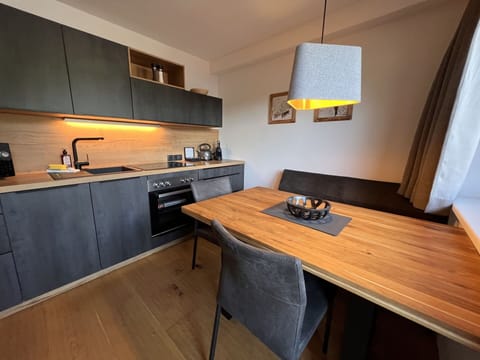 Property, Furniture, Cabinetry, Table, Wood, Countertop, Orange, Interior Design, Floor, Flooring