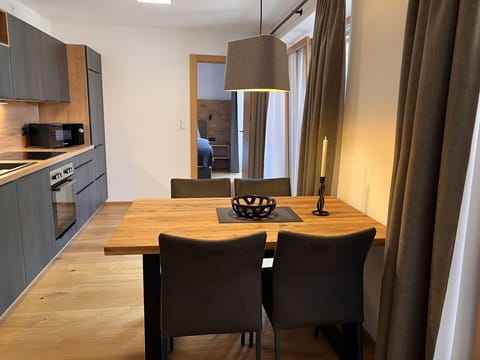 Furniture, Property, Cabinetry, Countertop, Wood, Chair, Interior Design, Table, Curtain, Building