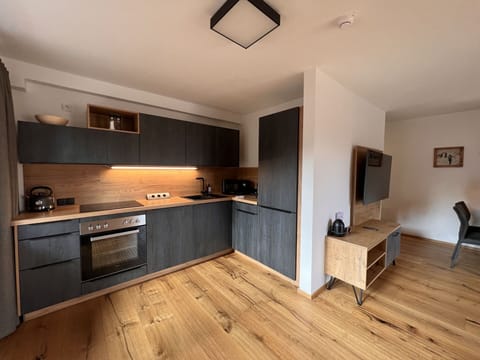 Cabinetry, Property, Furniture, Countertop, Wood, Interior Design, Floor, Flooring, Kitchen, Wood Stain