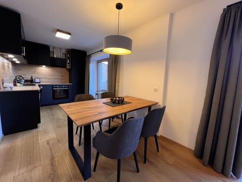 Table, Property, Furniture, Cabinetry, Wood, Lighting, Chair, Interior Design, Countertop, Flooring